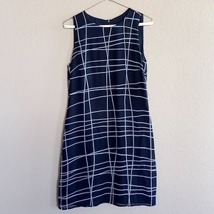 Polyester with silk lined dress. Great for the office or summer